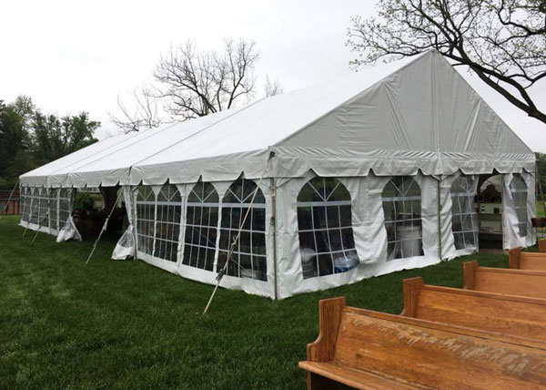 tents A large TRU event rental tent with window like sides.